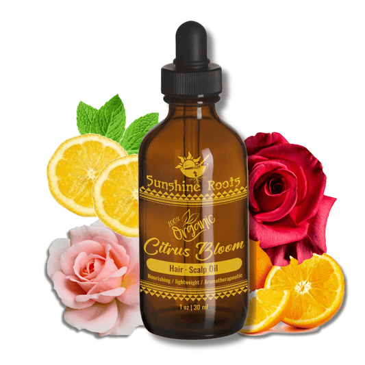 Bottle of Sunshine Roots Citrus Bloom hair and scalp oil with citrus fruits and flowers on a white background